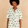 Farm Rio Cross Stitch Coconut Embroidered Romper 1 Farm Rio Cross Stitch Coconut Embroidered Romper -Farm Rio 313624 01